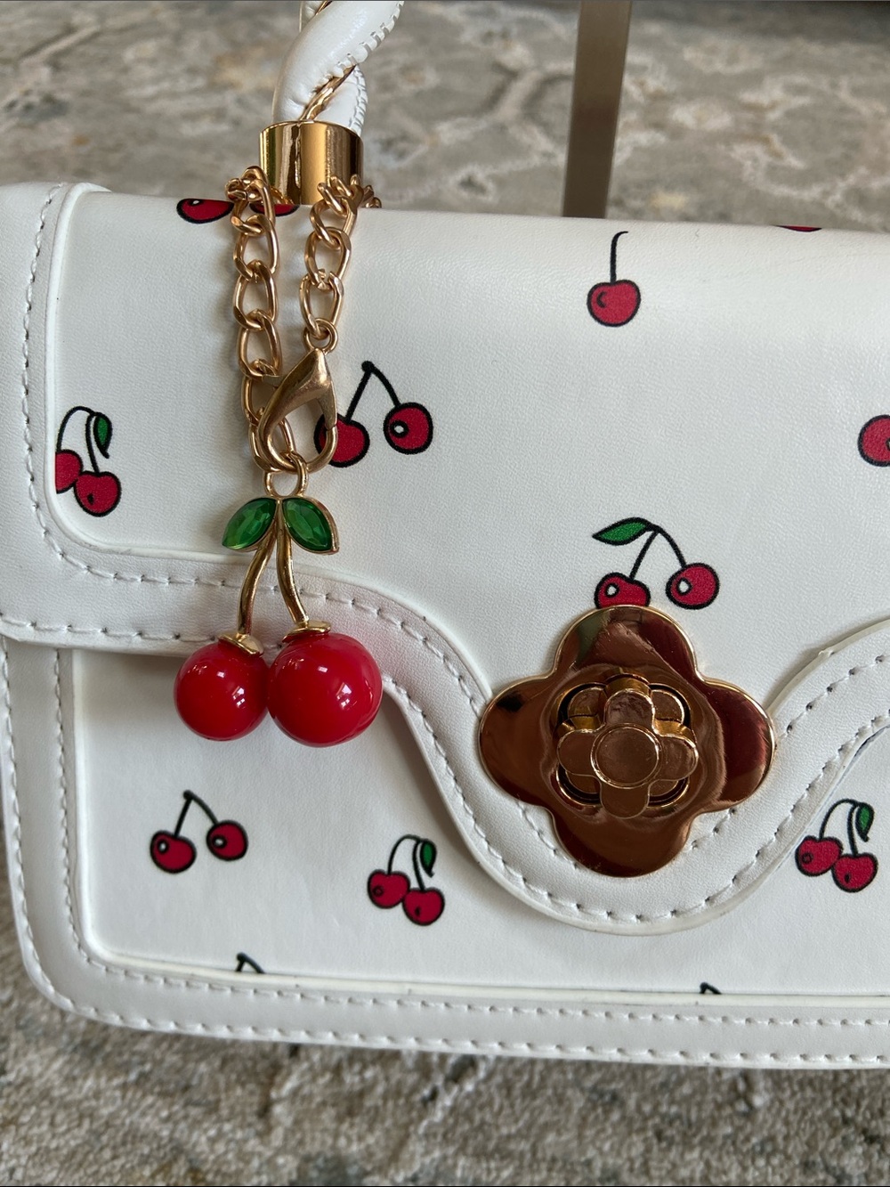 White Cherry Print Mini Crossbody Bag with Top Handle and Turn Lock Hardware - Picture 2 of 12
